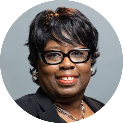 Dr. MILLICENT BOMBASE.